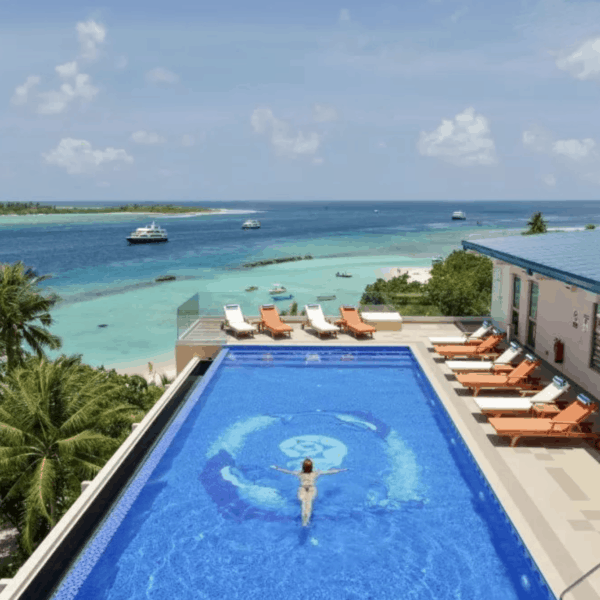 season paradise thulusdhoo island maldives surf hotel cokes chickens