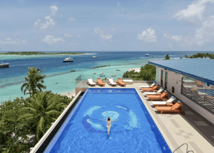 season paradise thulusdhoo island maldives surf hotel cokes chickens