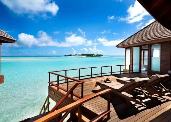 anantara dhigu overwater villa overwater bungalow maldives surf resort stoked surf adventures 2