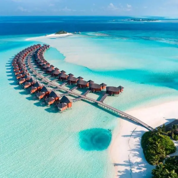anantara dhigu overwater villa overwater bungalow maldives surf resort stoked surf adventures 2