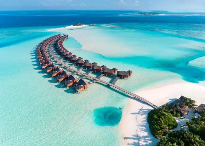 anantara dhigu overwater villa overwater bungalow maldives surf resort stoked surf adventures 2