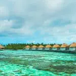 como malifushi maldives surf resort stoked surf adventures water suite 2