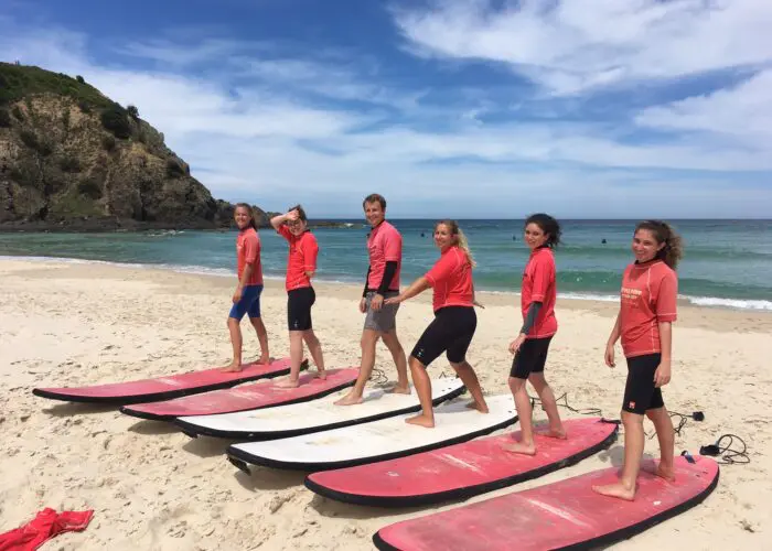 learn to surf in byron bay byron bay surf lesson style surfing group lessons private the pass 3