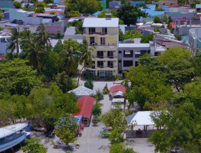 Noah Beach House Maldives Surf Package - Himmafushi jailbreaks surf camp stoked surf adventures local island