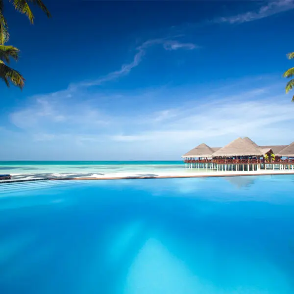 Medhufushi island resort maldives surf resort meemu atoll central atolls stoked surf adventures luxury surf trip