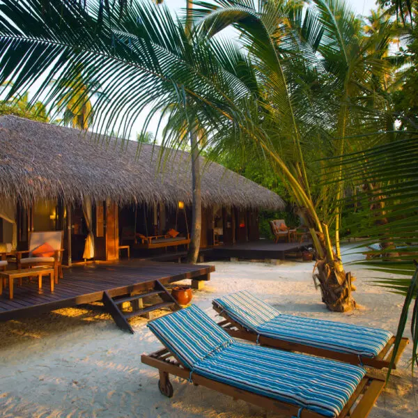Medhufushi island resort maldives surf resort meemu atoll central atolls stoked surf adventures luxury surf trip