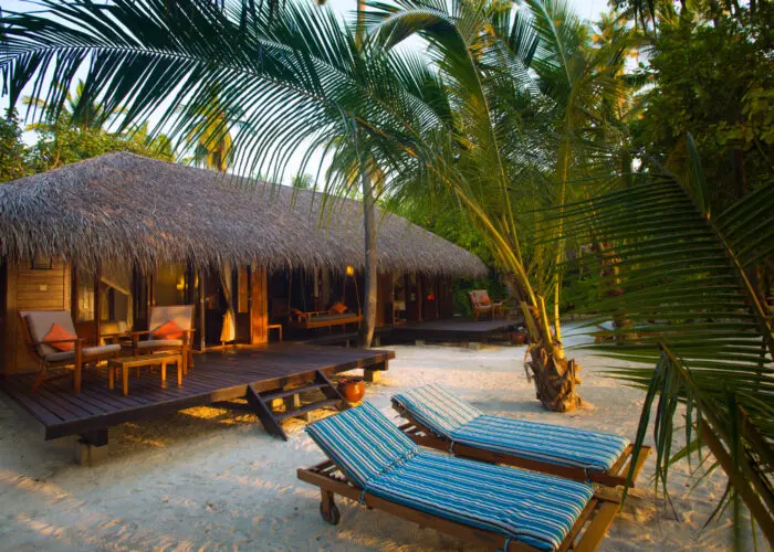 Medhufushi island resort maldives surf resort meemu atoll central atolls stoked surf adventures luxury surf trip