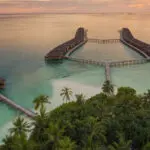 Medhufushi island resort maldives surf resort meemu atoll central atolls stoked surf adventures luxury surf trip