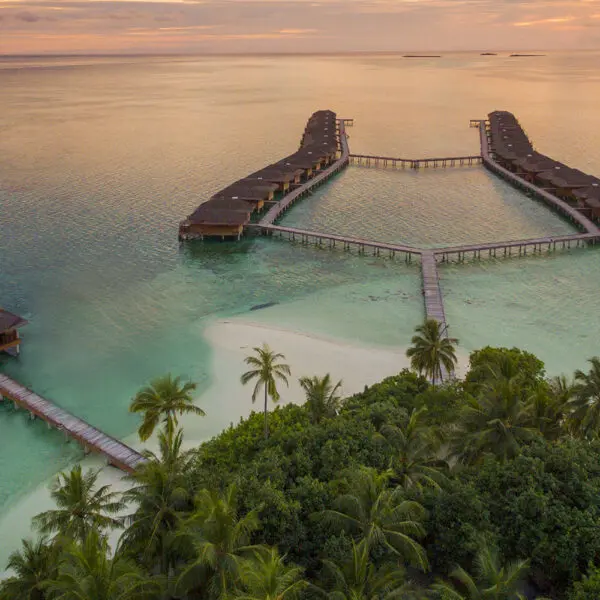 Medhufushi island resort maldives surf resort meemu atoll central atolls stoked surf adventures luxury surf trip