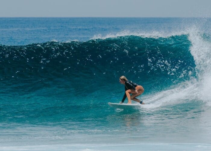 learn to surf in the maldives thulusdhoo surf camp lessons stoked surf adventures akiri surf 2