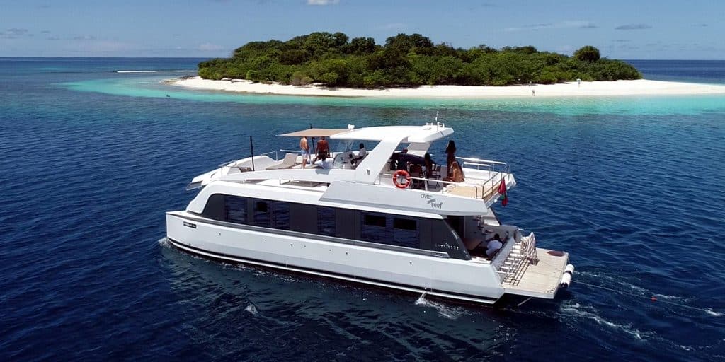 over reef private maldives surf charter boat floating villa