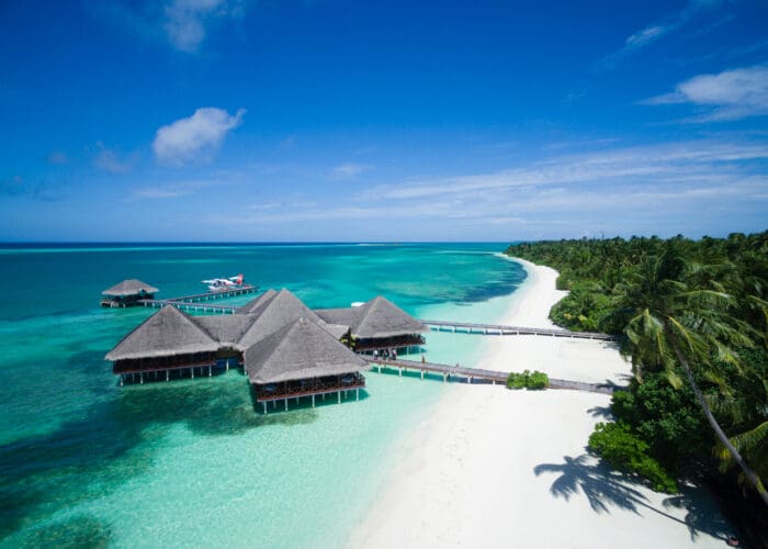 Medhufushi island resort maldives surf resort meemu atoll central atolls stoked surf adventures luxury surf trip