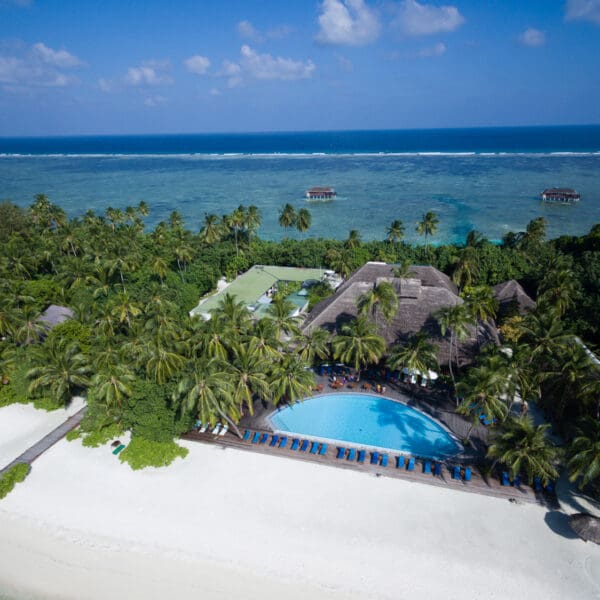 Medhufushi island resort maldives surf resort meemu atoll central atolls stoked surf adventures luxury surf trip
