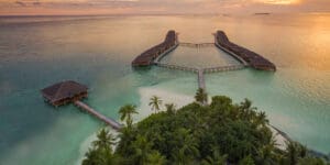 Medhufushi island resort maldives surf resort meemu atoll central atolls stoked surf adventures luxury surf trip