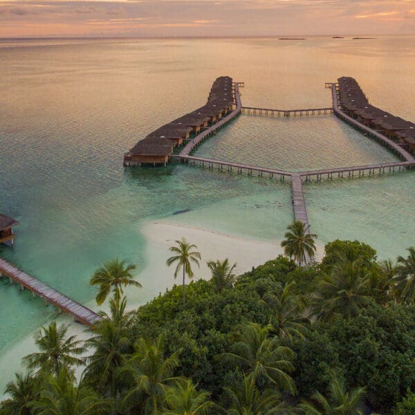 Medhufushi island resort maldives surf resort meemu atoll central atolls stoked surf adventures luxury surf trip
